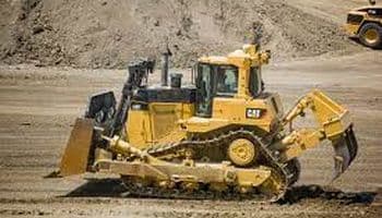 Image of Caterpillar bulldozer on job site.